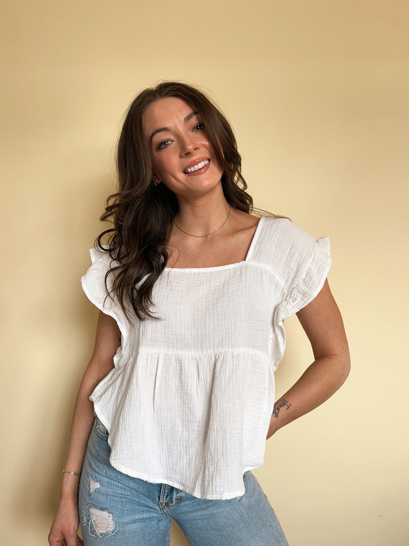 Ruffled Peplum Top in Off White